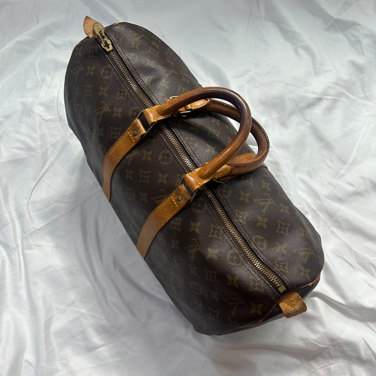 Louis Vuitton Keep Pall