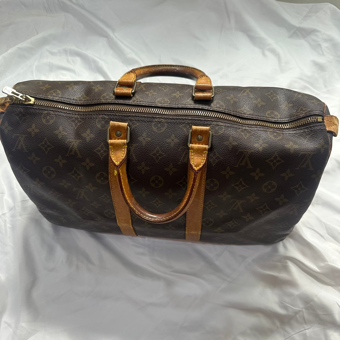 Louis Vuitton Keep Pall
