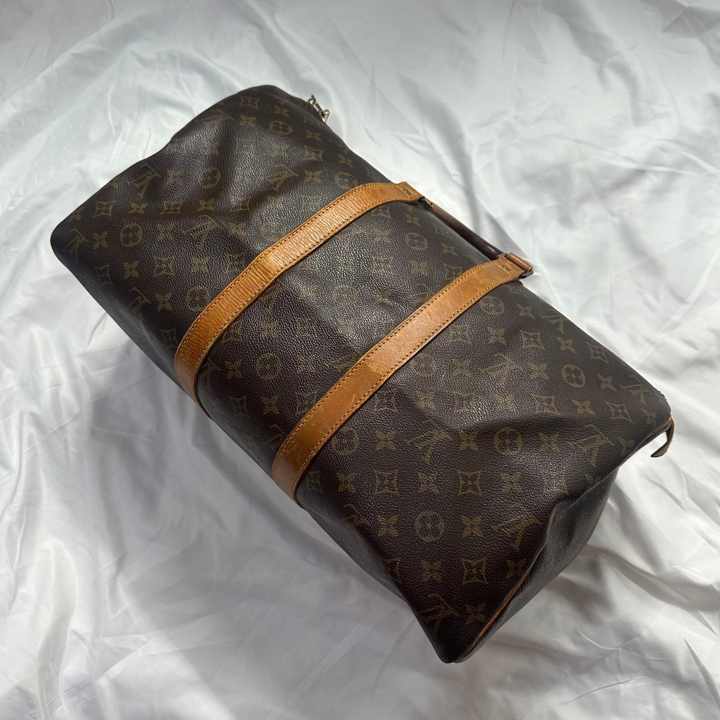 Louis Vuitton Keep Pall