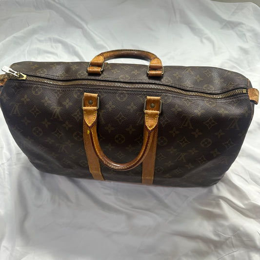 Louis Vuitton Keep Pall